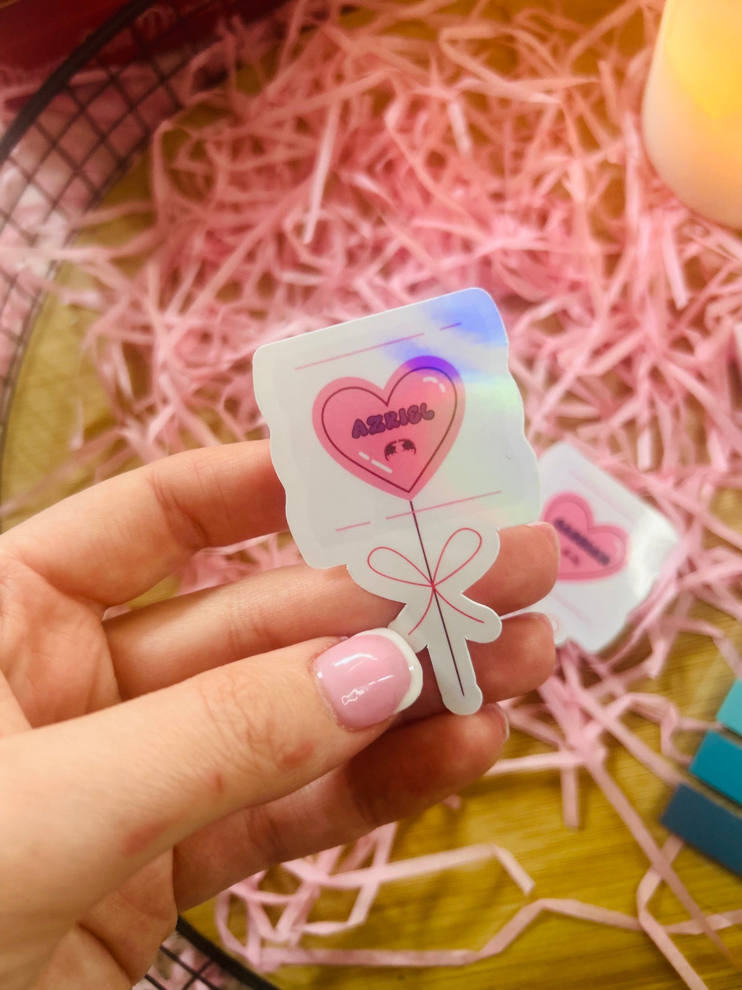 Holographic ACOTAR candy heart balloon stickers featuring Rhysand, Cassian, and Azriel. Perfect bookish merch for fantasy lovers, ideal for decorating laptops, water bottles, and journals.