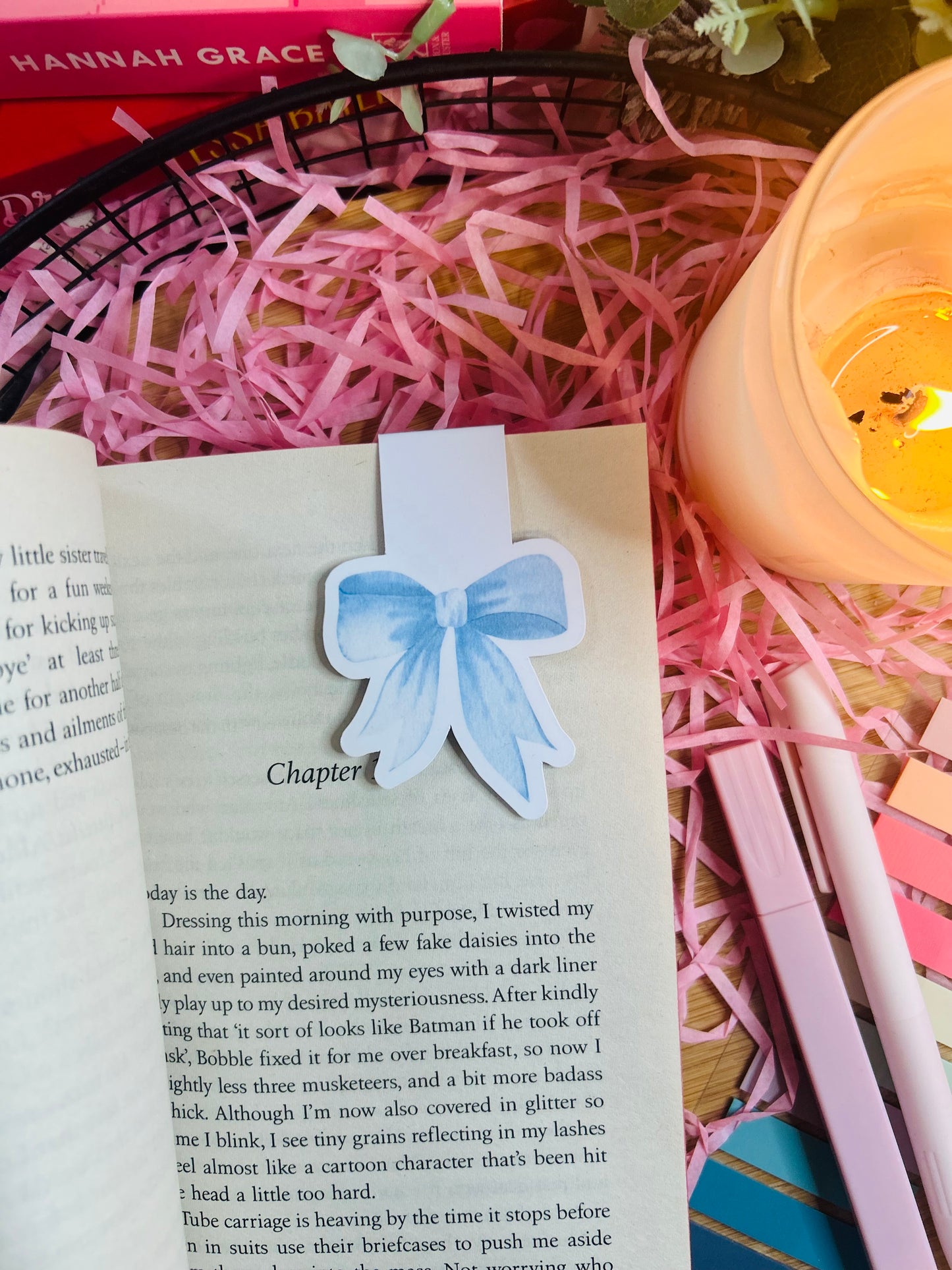 Pastel bow magnetic bookmarks in pink and blue, featuring a delicate ribbon design. Laminated for durability and made with high-quality photo paper for vivid colors. Perfect for book lovers and aesthetic reading accessories.