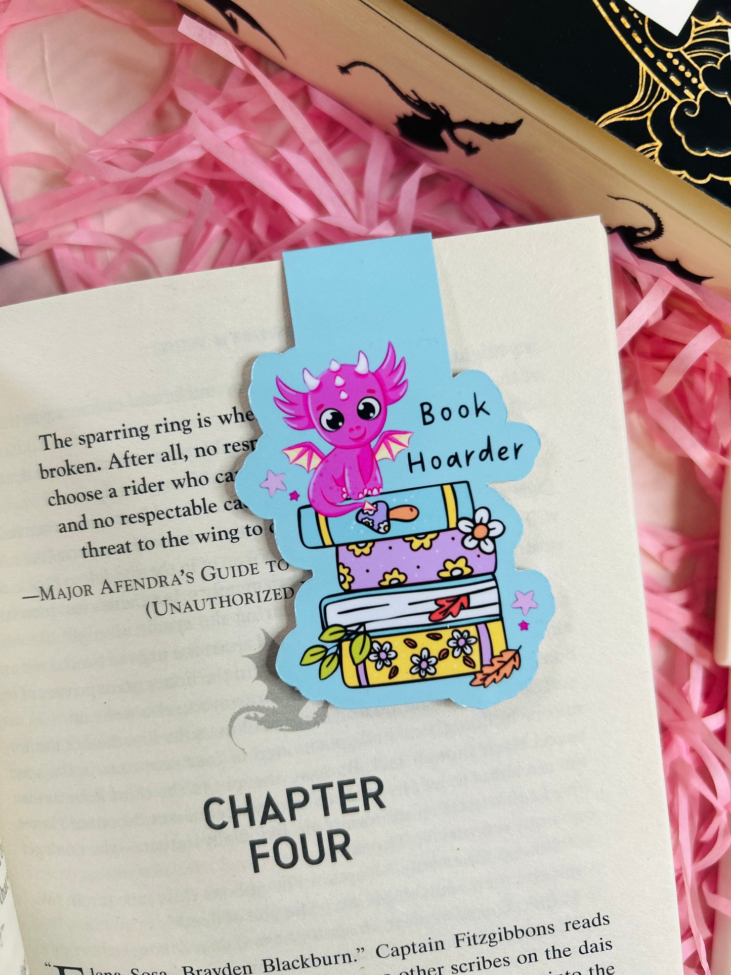 This single "Book Hoarder" magnetic bookmark looks so charming! It showcases a fun design and vibrant colors that would appeal to book lovers.