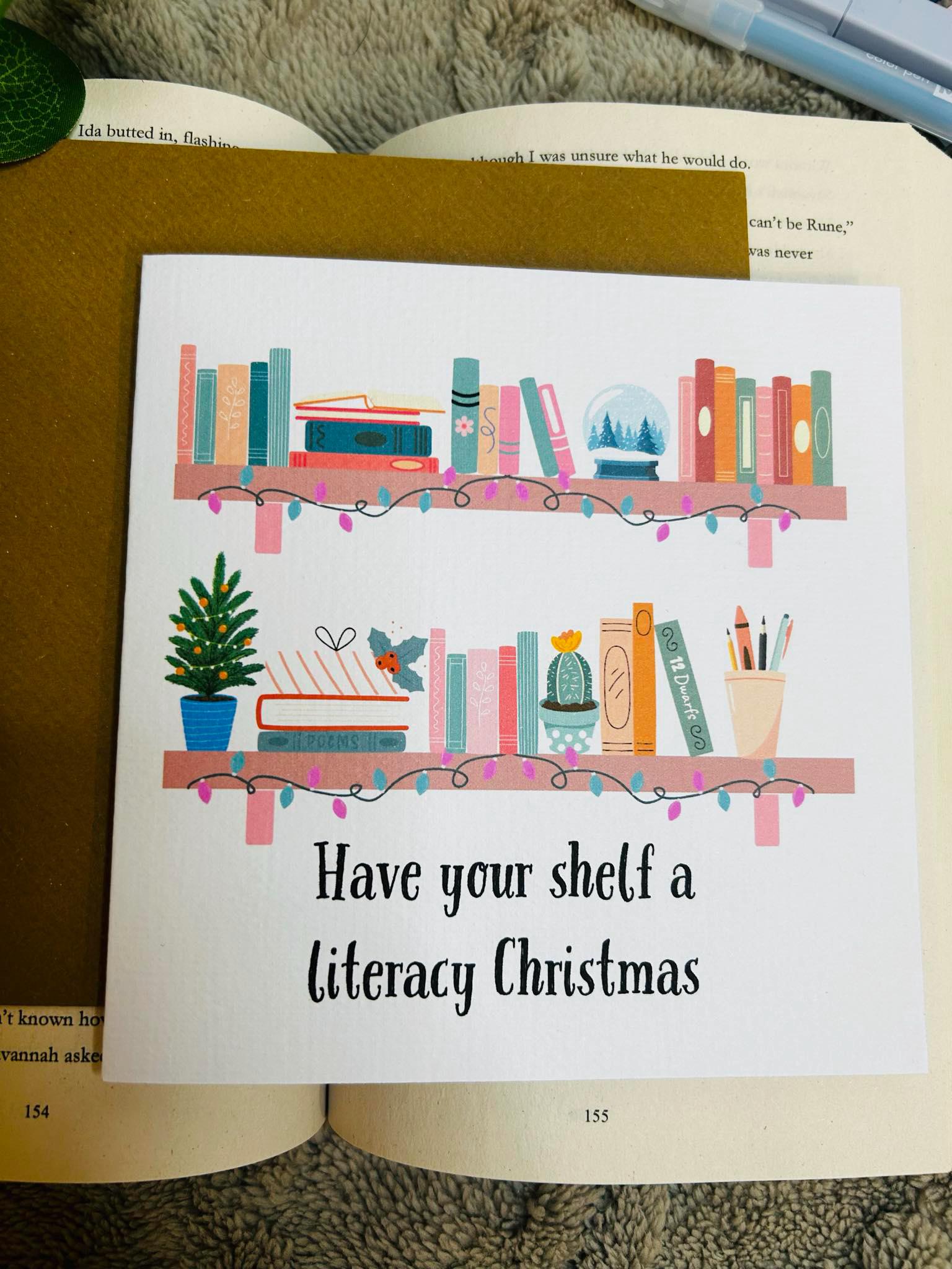 Literary Christmas shelf card featuring festive bookish holiday design, perfect Christmas card for readers and book lovers.