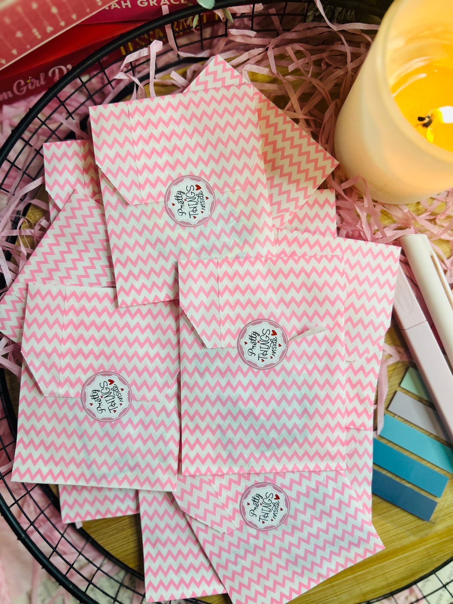 pink mystery bags containing bookish stickers