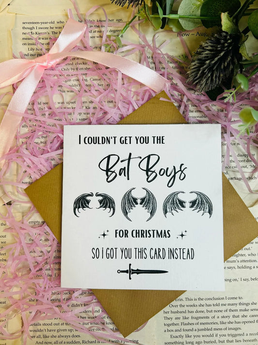 ACOTAR Christmas card featuring the Bat Boys in festive holiday theme, perfect bookish gift for Sarah J. Maas fans.