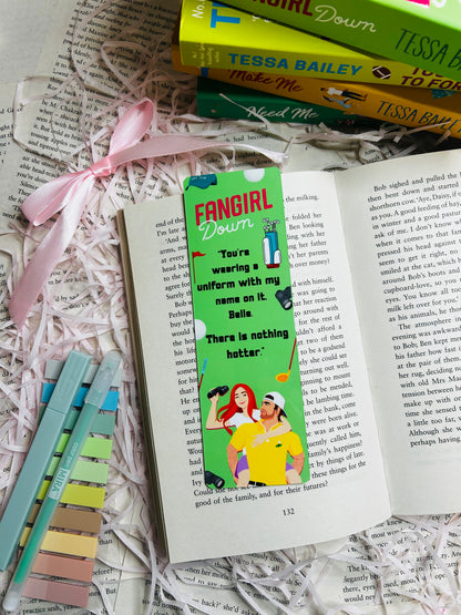 Green 'Fan Girl Down' inspired bookmark, perfect for fans of Tessa Bailey’s steamy romances and swoon-worthy characters, with golf ball, caddy, hat and binoculars printed on it.