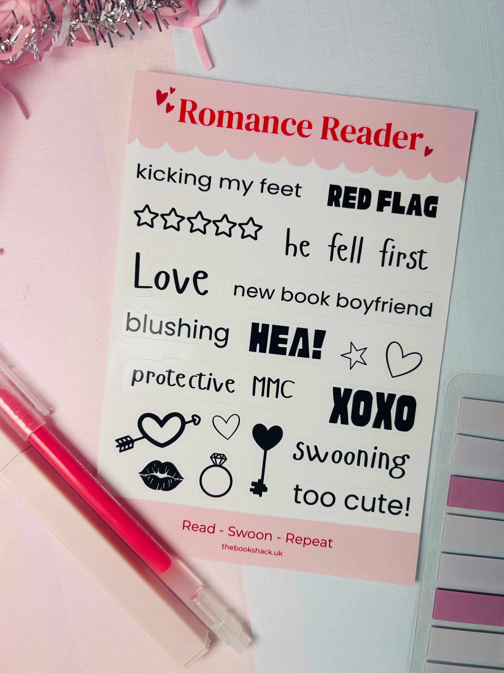 Sticker sheet with Romance Reader title, hearts, stars, and XOXO icons and phrases