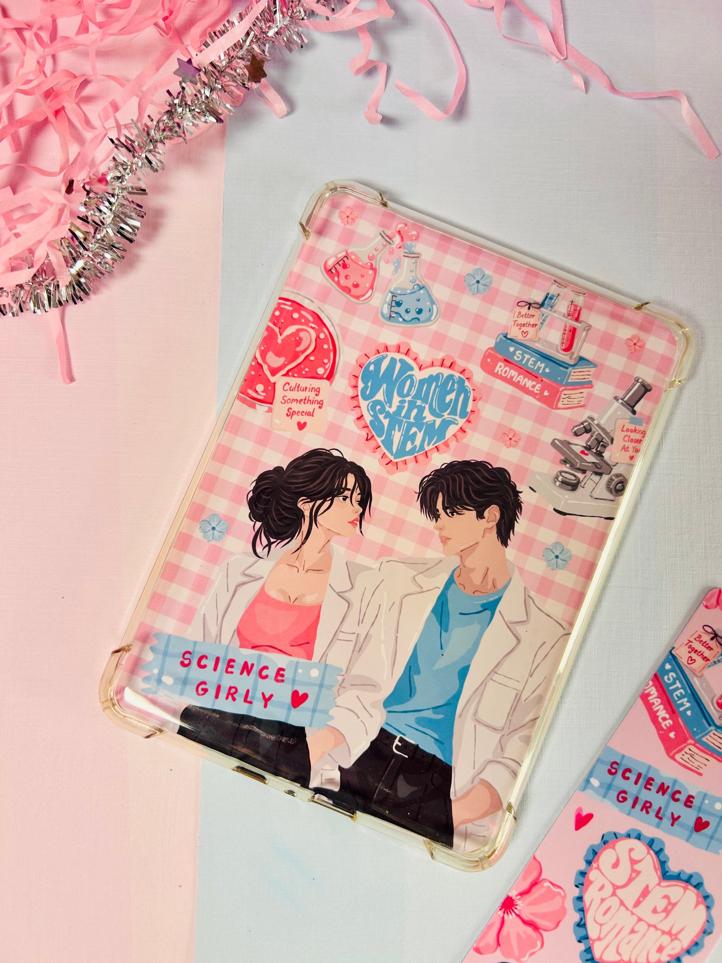 Double-sided STEM romance Kindle insert with pink science-themed couple illustration