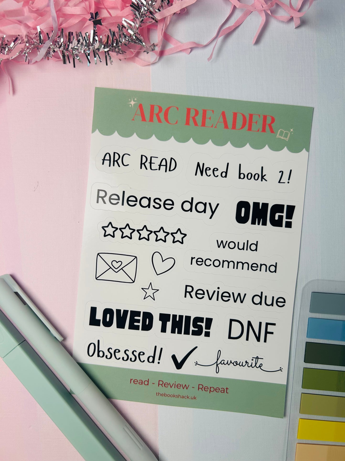 ARC Reader sticker sheet with bookish phrases and icons, green/black lettering