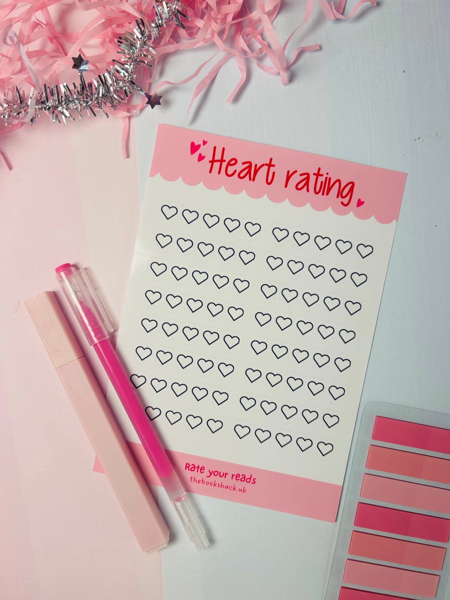 Heart rating sticker sheet with pink header and outlined heart rating rows