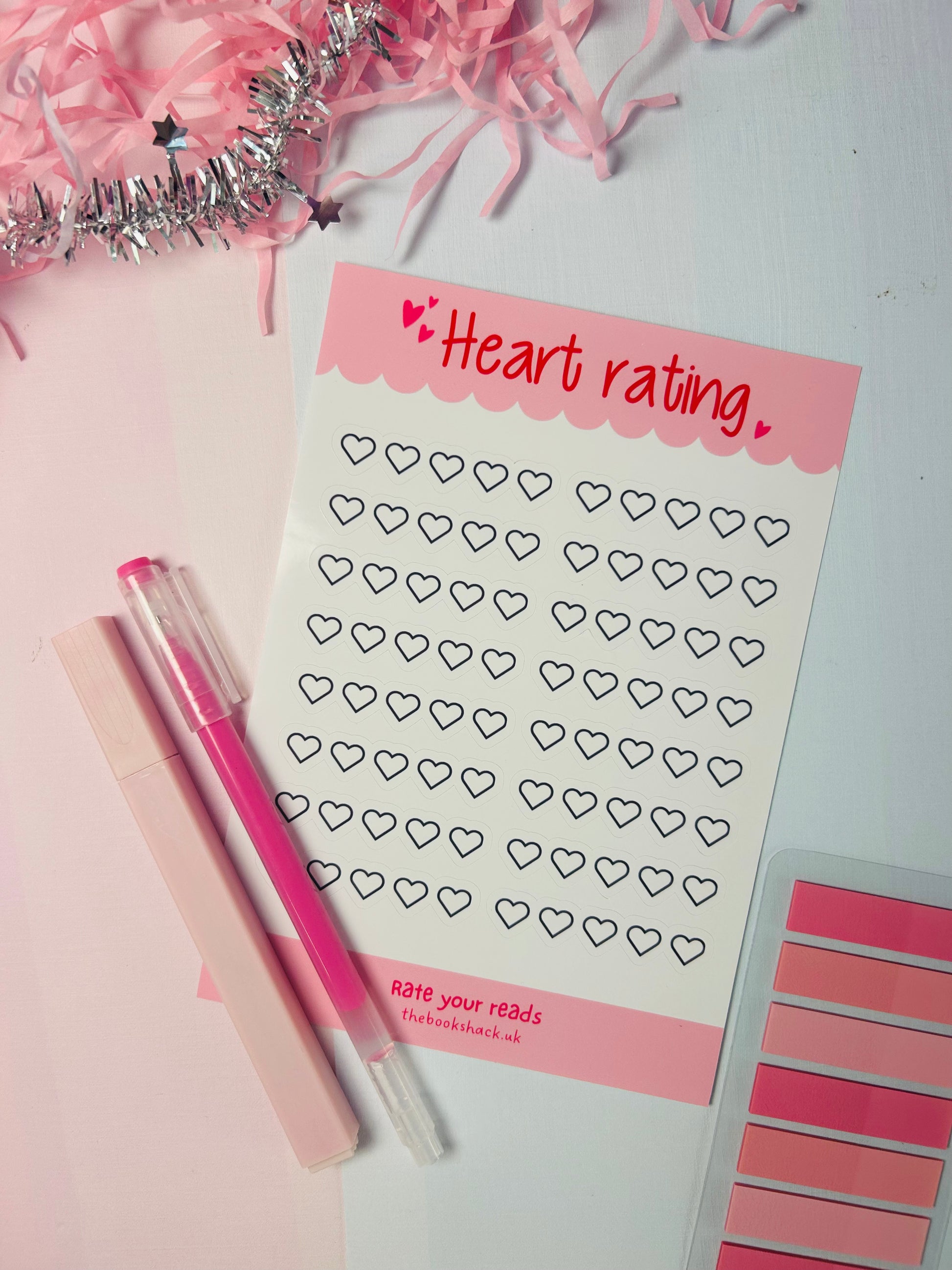 Heart rating sticker sheet with pink header and outlined heart rating rows