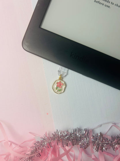 Gold flower Kindle USB-C dust plug charm with pink and red enamel center