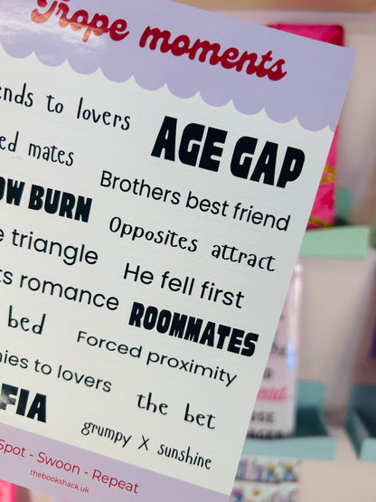 Close-up trope moments sticker sheet featuring bold 'Age Gap' and 'Roommates' text