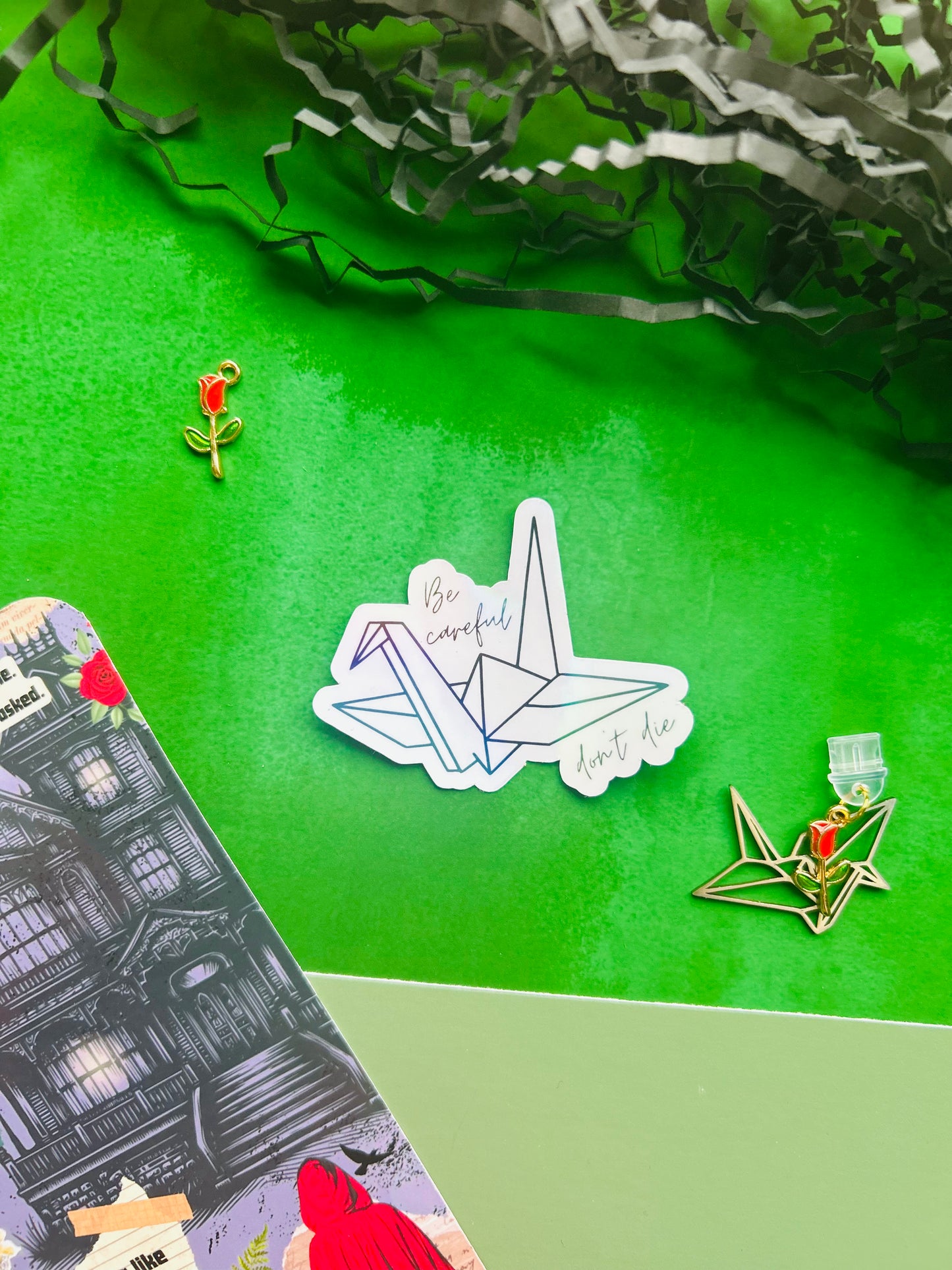 Alchemised/dramione crane ‘be careful don’t die’ Inspired Holographic Sticker – Fantasy Bookish Laptop & Kindle Decal