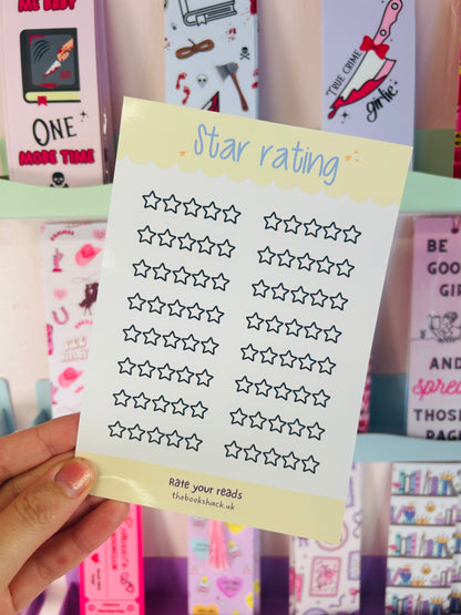 Star rating sticker sheet held up with dark navy outlined stars and yellow top banner