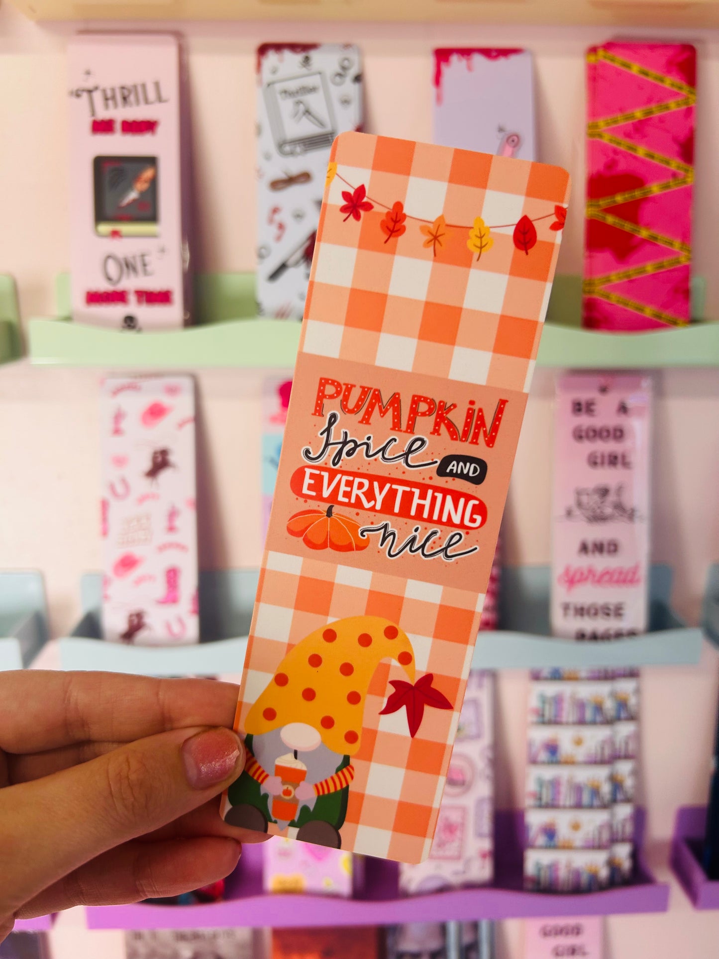 Orange plaid gnome bookmark close-up; reads 'Pumpkin spice and everything nice'