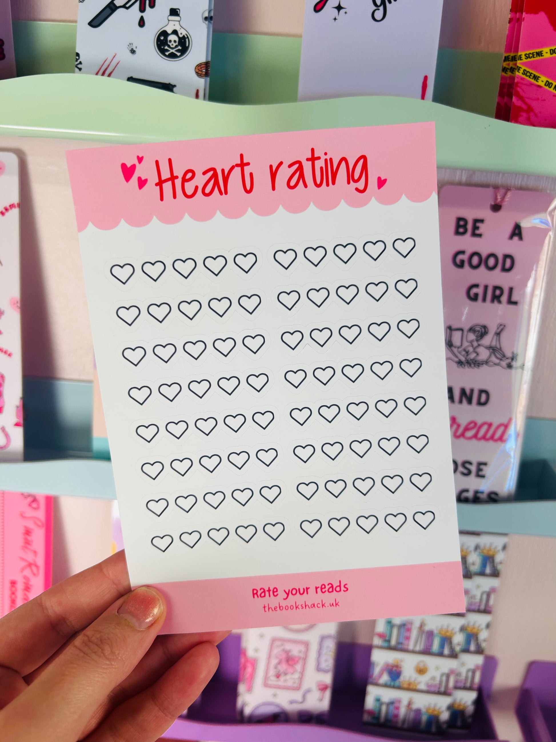 Heart rating sticker sheet, hand holding; pink 'Heart rating' header with heart outlines