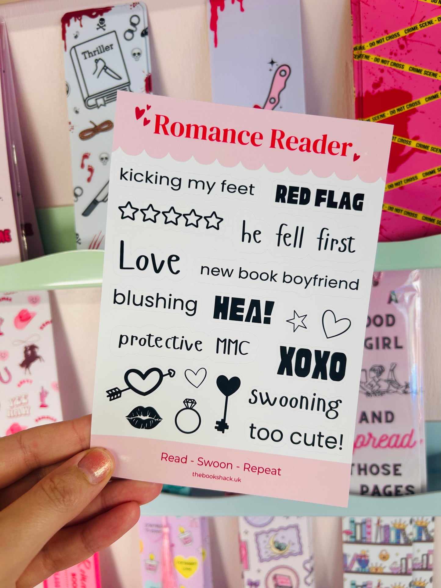 Sticker sheet held in hand with Romance Reader title, hearts, stars, and XOXO phrases