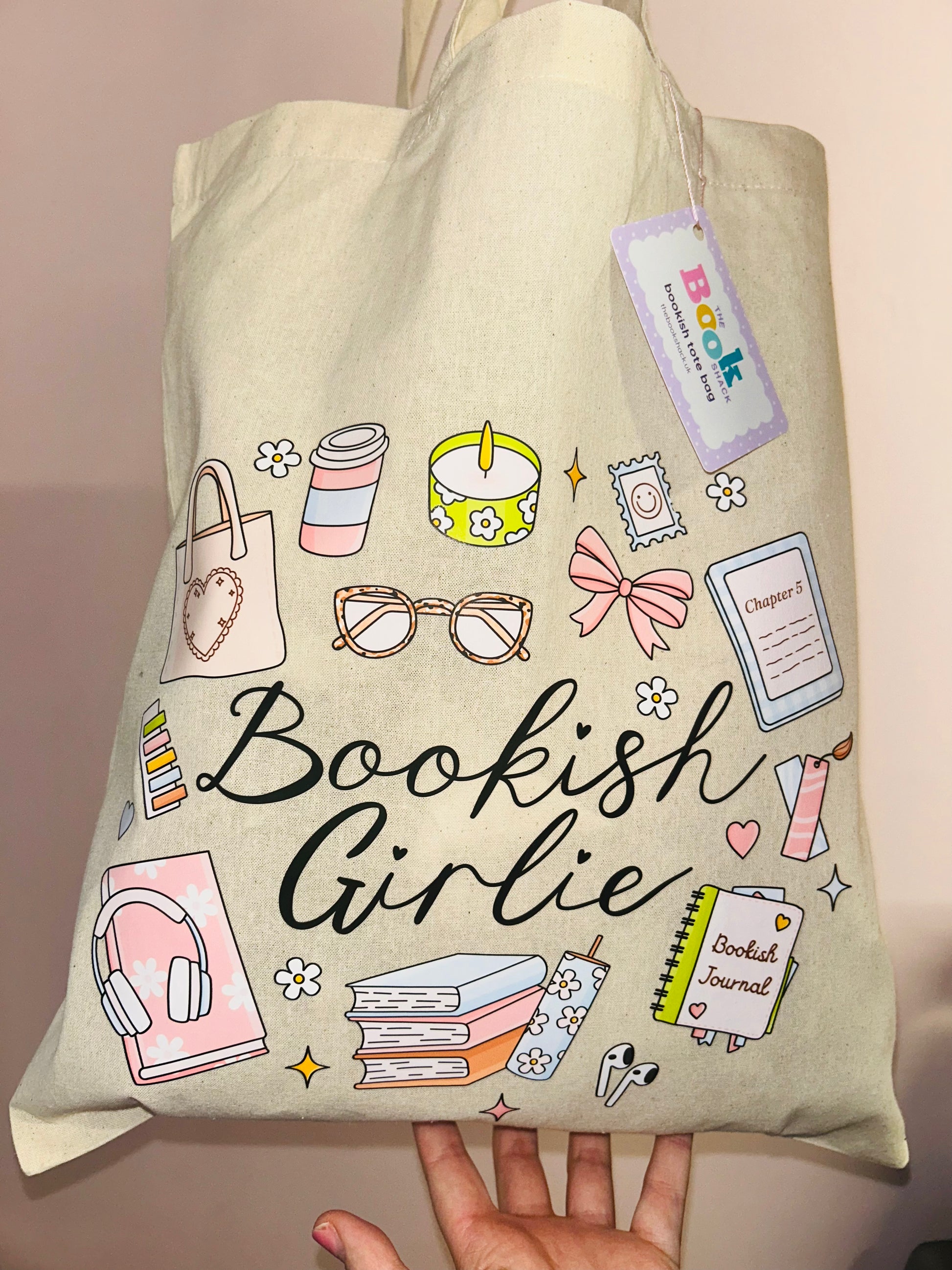 Cotton tote bag front view with 'Bookish Girlie' text, books and butterfly icons