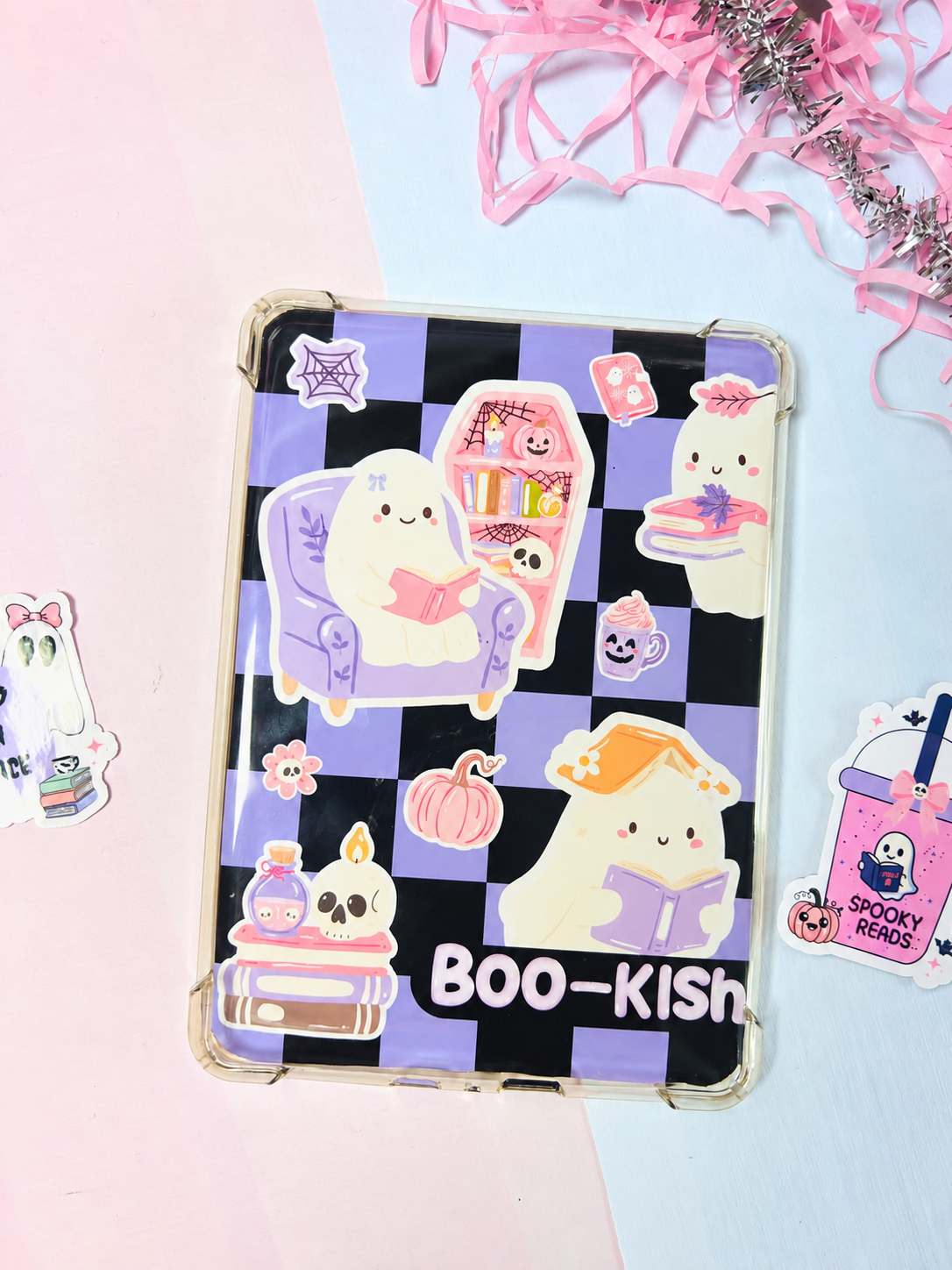 Halloween ebook insert with purple-and-black checkerboard and cute ghost reading art
