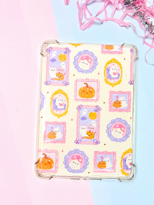 Double-sided Kindle insert with pastel Halloween character stickers in clear frame