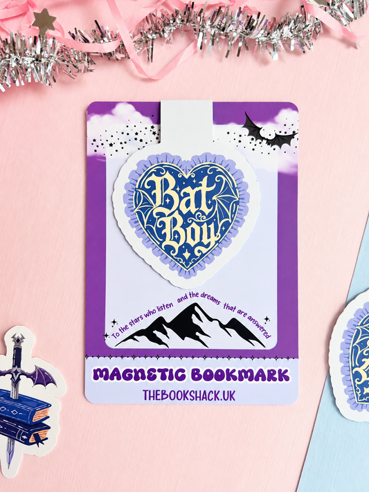 Heart-shaped blue and white magnetic bookmark card with Bat Boy logo design