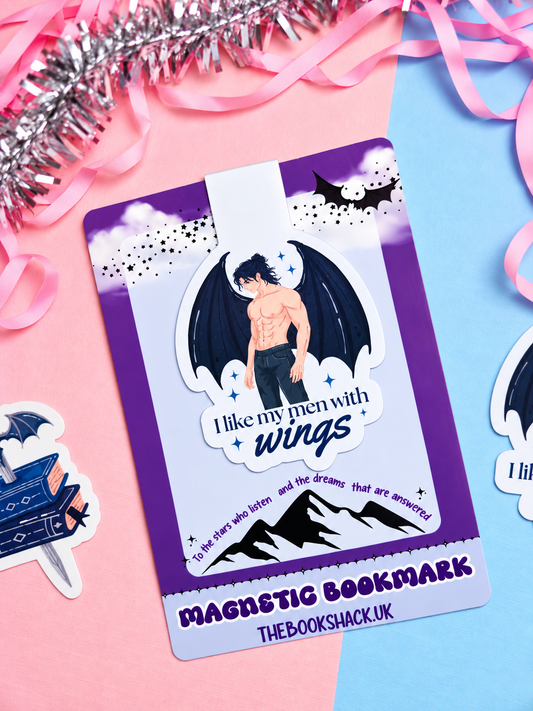 Magnetic bookmark card featuring winged character illustration and blue "I like my men with wings" text