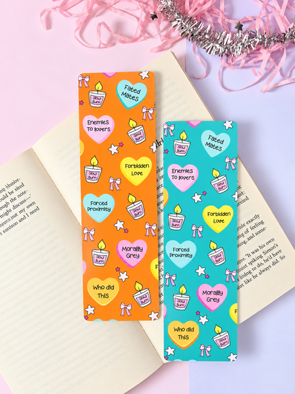 Pair of printed fantasy bookmarks with icons, orange and teal