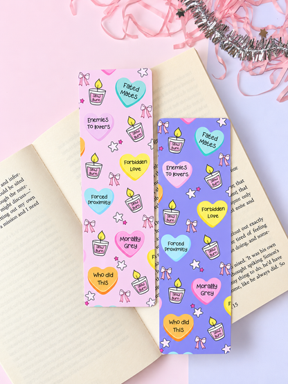 Pair of printed fantasy bookmarks with icons, purple and yellow-orange