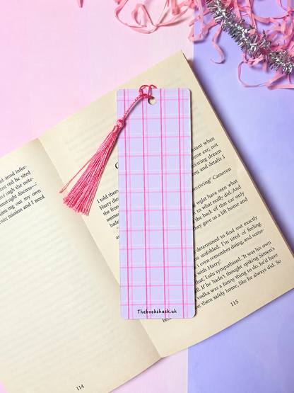 Bookmark with pink tassel and pink grid plaid design on the cover