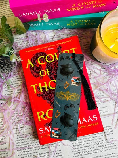 Bookmark inspired by Nesta from ACOTAR with winding stars, harp, masquerade mask, and wine – symbolizing her strength and transformation.