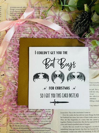 ACOTAR Christmas card featuring the Bat Boys in festive holiday theme, perfect bookish gift for Sarah J. Maas fans.