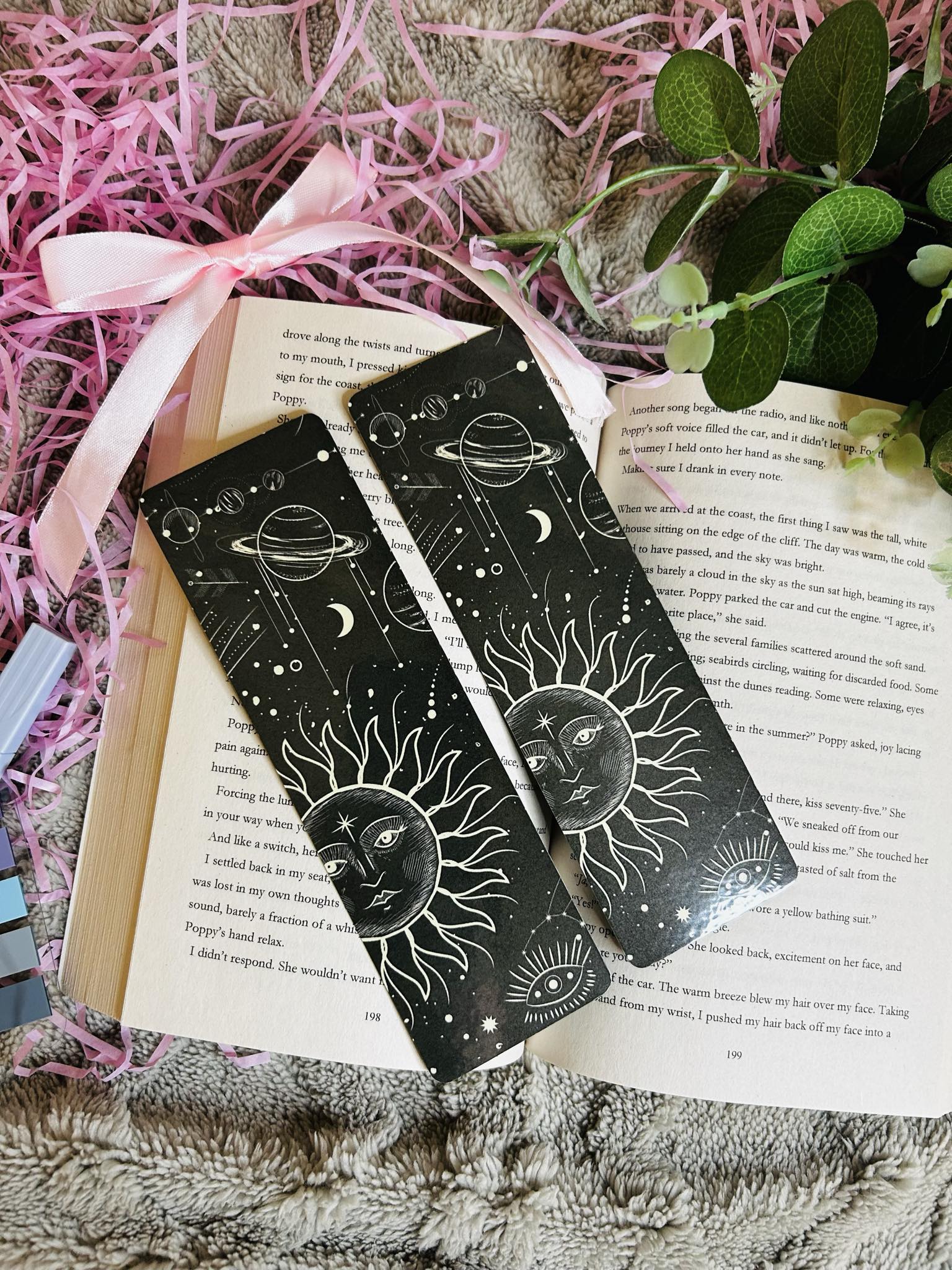 Bookmark with celestial sun and planet design, featuring stars and cosmic elements – perfect for stargazers and cosmic bookworms.