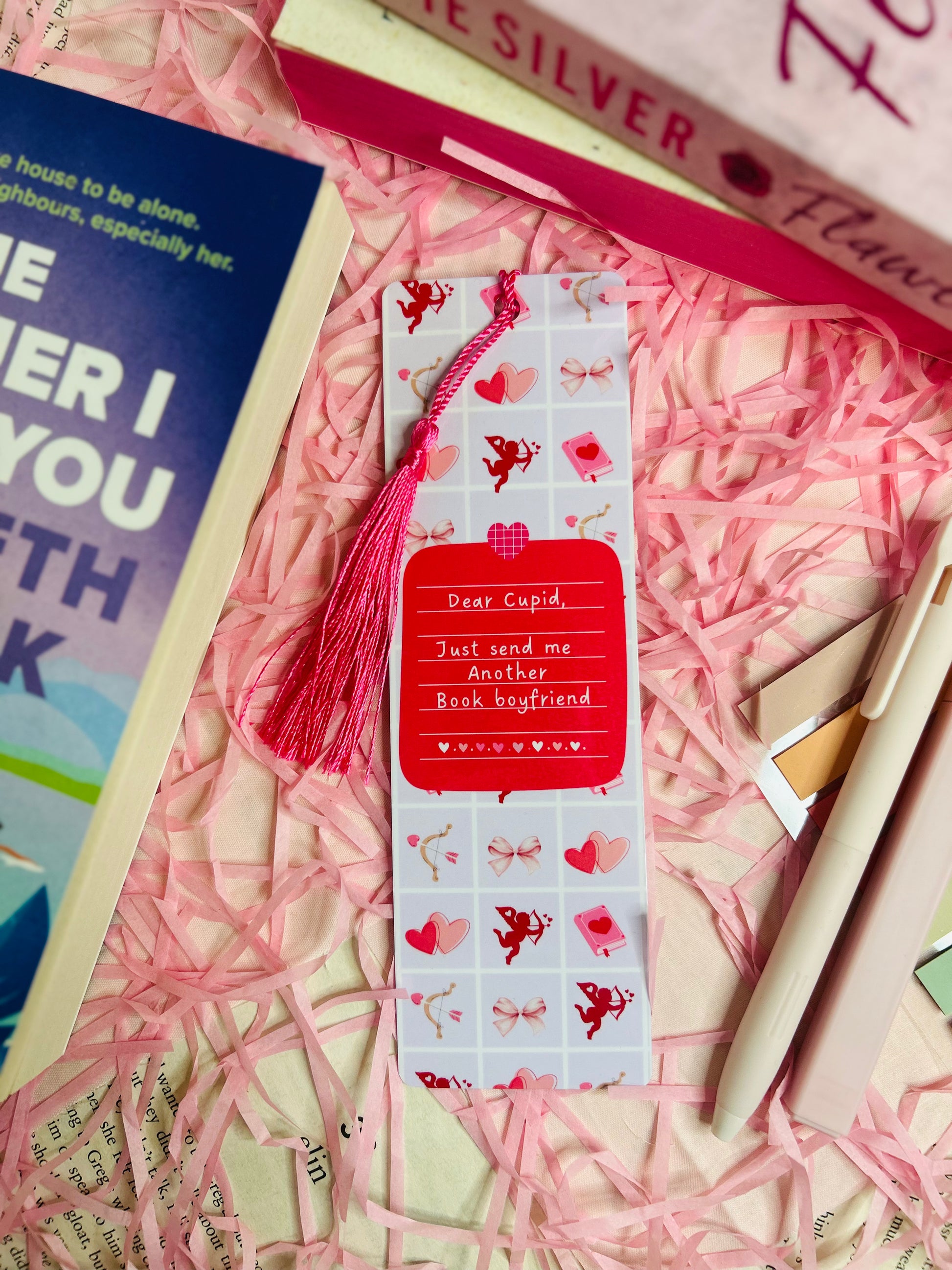 red and pink Bookmark with the text 'Dear Cupid, Send Me a Book Boyfriend,' perfect for romance readers looking for their next bookish crush