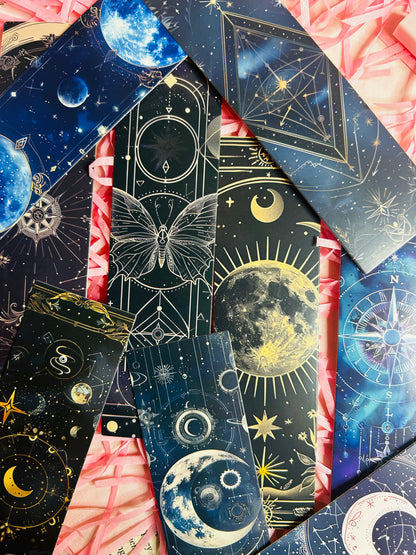 selection of blue and black celestial/fantasy bookmarks, space, galaxy and moon themed