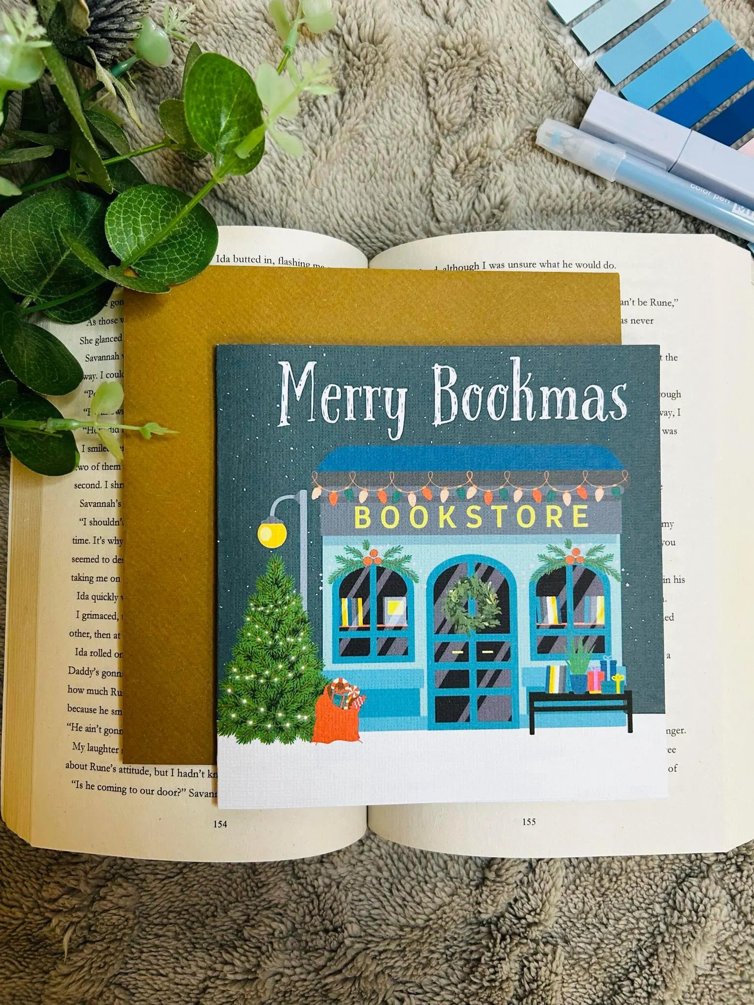 Cosy bookish bookstore Christmas card, festive holiday card for book lovers and readers, perfect literary Christmas gift.