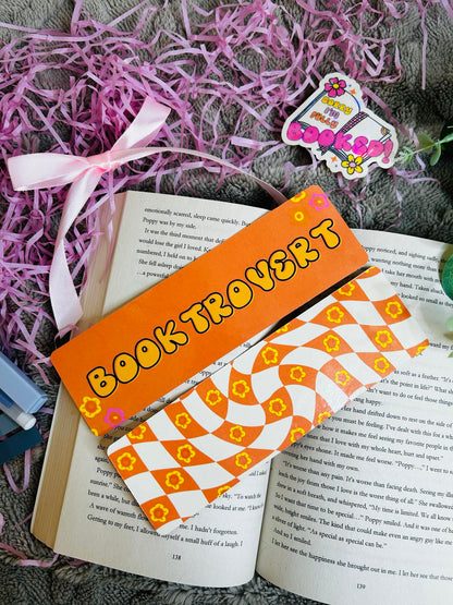 Bookmark with the word 'Booktrovert' in playful lettering – ideal for introverted book lovers who prefer stories over small talk.