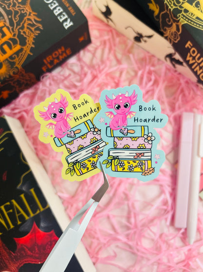 Colourful 'Book Hoarder' stickers featuring adorable pink dragons sitting atop stacks of books