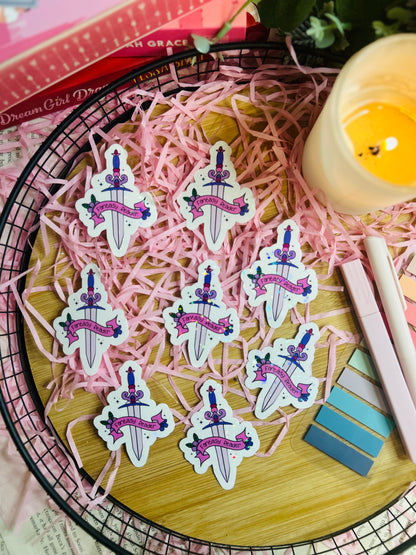Holographic "Fantasy Reader" sword sticker with a pink and purple design, featuring a decorative sword wrapped in a ribbon banner. Perfect for book lovers and fantasy fans.