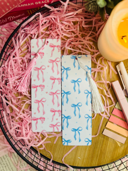 A pair of aesthetic bookmarks featuring pastel pink and blue delicate bow design