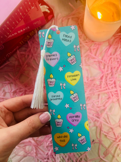 Holographic book trope bookmarks with tassels, featuring phrases like "Enemies to Lovers," "Fated Mates," and "Morally Grey." Perfect aesthetic gift for book lovers and romance readers. ✨📚