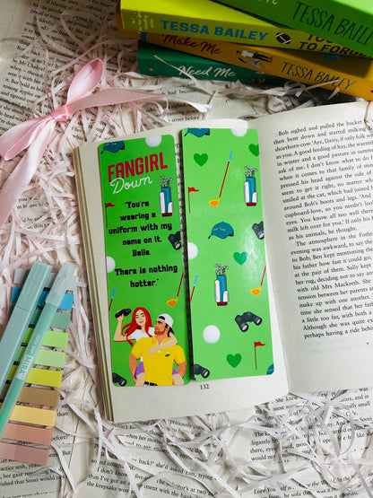 Green 'Fan Girl Down' inspired bookmark, perfect for fans of Tessa Bailey’s steamy romances and swoon-worthy characters, with golf ball, caddy, hat and binoculars printed on it.