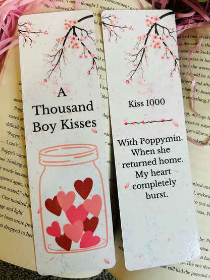 Set of 'A Thousand Boy Kisses' bookmarks adorned with cherry blossom branches and a jar filled with hearts