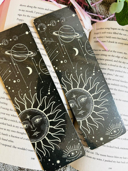 Bookmark with celestial sun and planet design, featuring stars and cosmic elements – perfect for stargazers and cosmic bookworms.