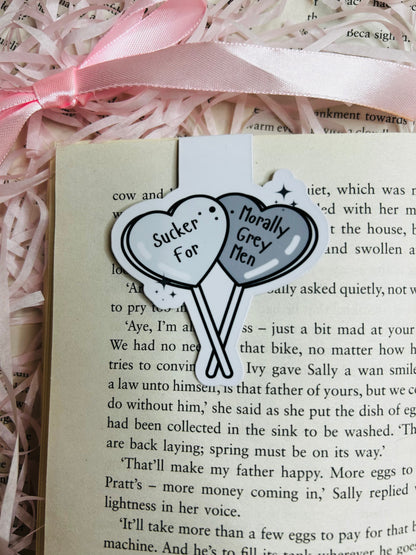 Magnetic bookmark featuring two heart-shaped balloons in shades of white and grey, labelled 'Sucker for Morally Grey Men.' 