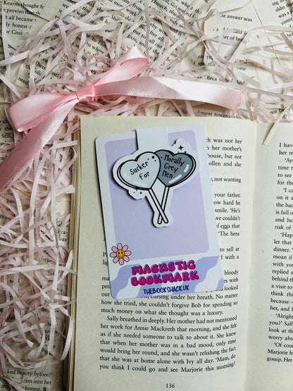 Magnetic bookmark featuring two heart-shaped balloons in shades of white and grey, labelled 'Sucker for Morally Grey Men.' 