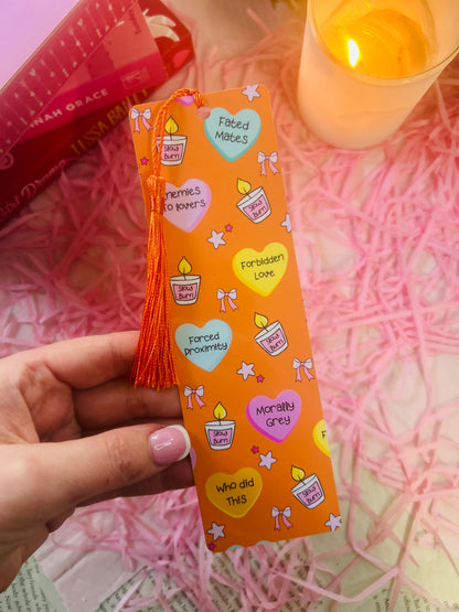 Holographic book trope bookmarks with tassels, featuring phrases like "Enemies to Lovers," "Fated Mates," and "Morally Grey." Perfect aesthetic gift for book lovers and romance readers. ✨📚