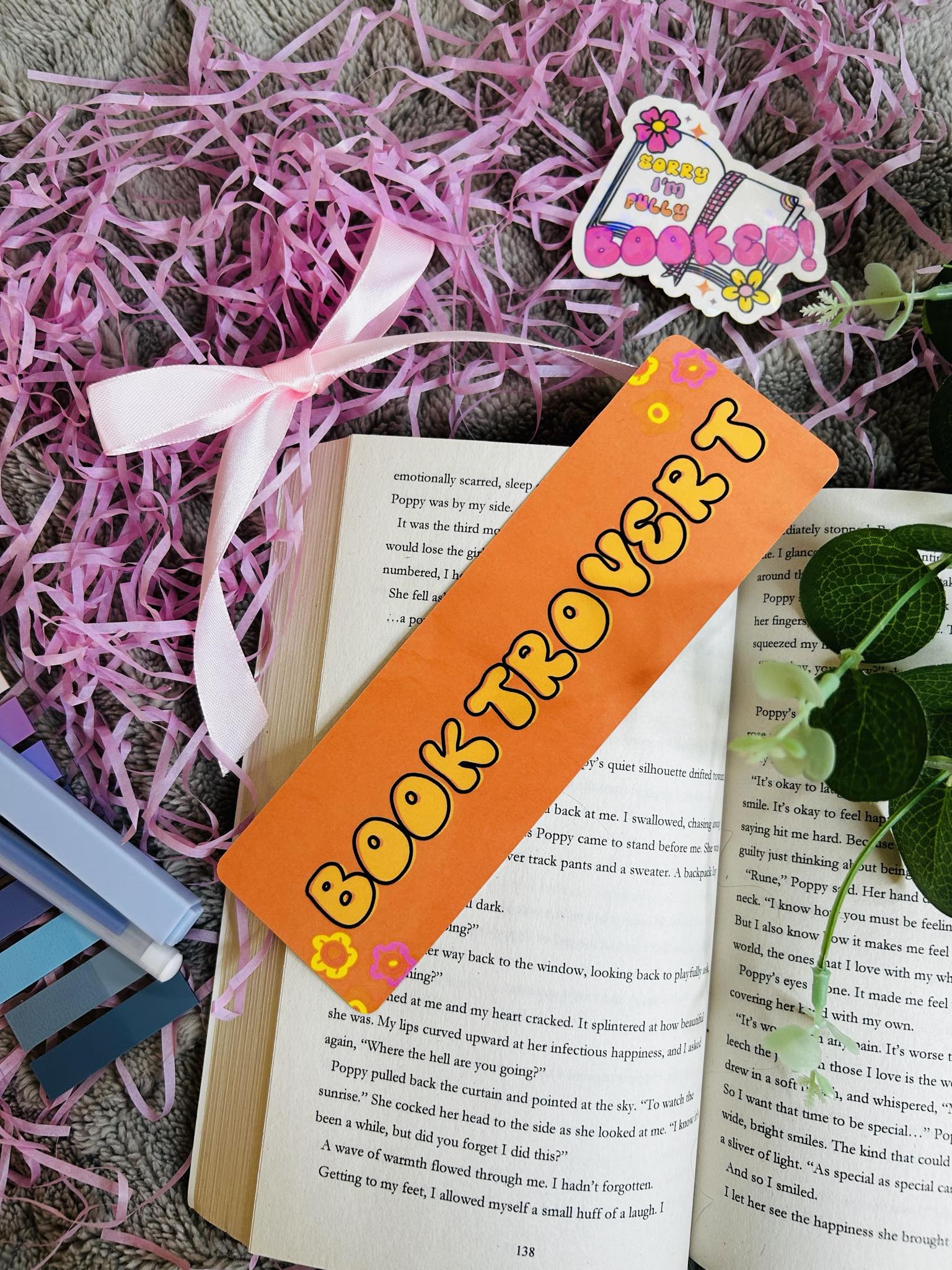 Bookmark with the word 'Booktrovert' in playful lettering – ideal for introverted book lovers who prefer stories over small talk.