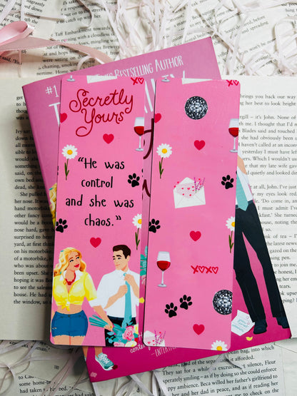 Pink 'Secretly Yours' inspired bookmark, perfect for Tessa Bailey fans who adore her steamy romances and swoon-worthy characters.
