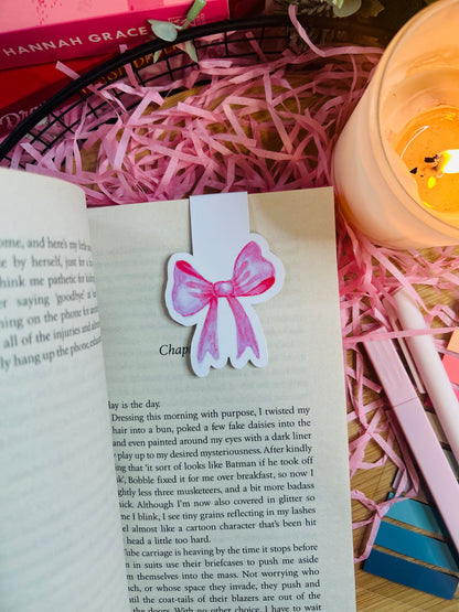 Pastel bow magnetic bookmarks in pink and blue, featuring a delicate ribbon design. Laminated for durability and made with high-quality photo paper for vivid colors. Perfect for book lovers and aesthetic reading accessories.