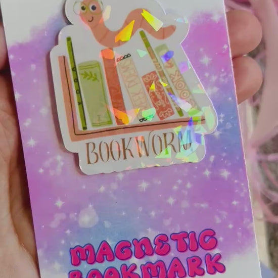 Magnetic bookmark with a charming 'Bookworm' design, with a stack of books