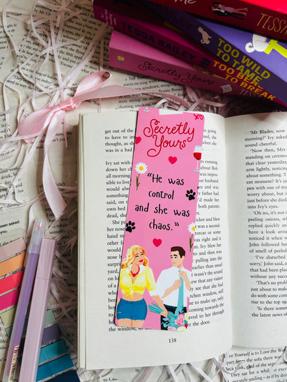 Pink 'Secretly Yours' inspired bookmark, perfect for Tessa Bailey fans who adore her steamy romances and swoon-worthy characters.