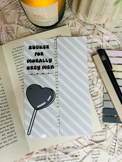 sucker for morally grey men bookmark, grey and white striped design with lollypop heart sweet